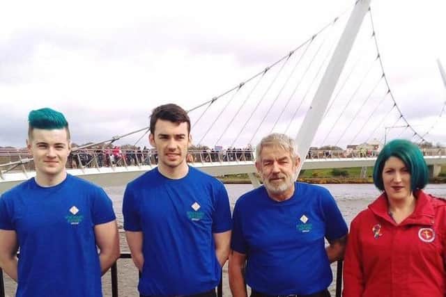 DJ Reid, Shea Moore, Dave Owen and Danielle Farren at the Walk for Autism Acceptance and Awareness on Derrys Peace Bridge last Saturday.