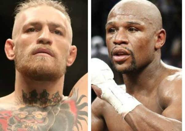 Conor McGregor (left) and Floyd Mayweather Jnr.