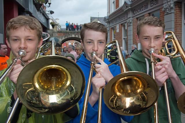 Trombonists Leon Gale, Foyle College,  Conor Polley,  Lumen Christie College and Tom Adair from Foyle College who took part in the parade through Derry City Centre as part of the annual City of Derry Jazz and Big Band Festival. Picture Martin McKeown. Inpresspics.com. 30.04.16