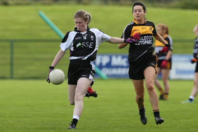 Aneica, who plays for Dungiven, in action during a football match last September. Photo: Dessie Loughrey