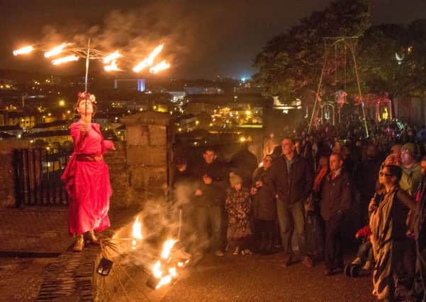 One of the fire dancers performs during the Awakening of The Walls in Derry back in 2016 as the City celebrates the 30th year of the annual Halloween festival. Picture Martin McKeown. Inpresspics.com. 28.10.16