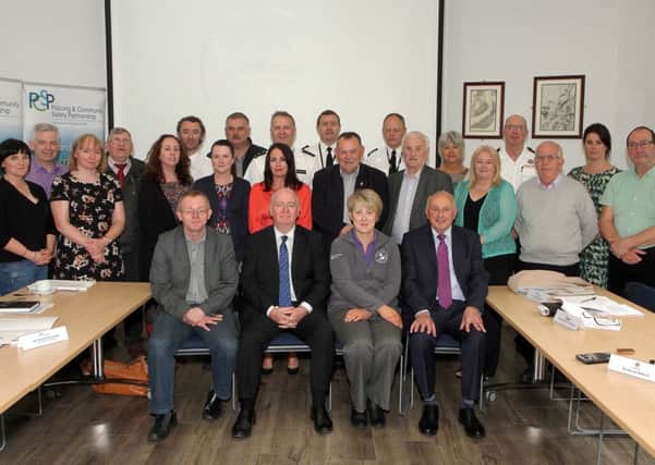 Police Ombudsman Dr. Michael Maguire (seated, second from left), at his meeting with the PCSP in St. Columbs Park House, pictured  with (seated, from left),  Councillor Eric McGinley, chairman of Derry City and Strabane District Councils PCSP,  independent member Margaret McLaughlin, and the Deputy Mayor  Alderman Thomas Kerrigan 2016-3706MT.