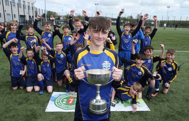 St Columbs's College captain Oran Kelly holds the cup after winning of the NISFA U12 Cup during the  during the  NISFA Finals Day at Ballymena Showgrounds. (
Picture by Brian Little/PressEye)