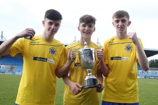 St Columb's College goal scorers Ryan Tabbit , Jordan McEneff and Adam McColgan after a 3-1 victory against St Patrick's College.