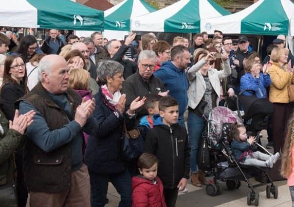Part of the audience who listened as members of Lisneal College's Jazz Band performed in Guildhall Square on Saturday afternoon. Picture Martin Mckeown. Inpresspics.com. 29.04.17