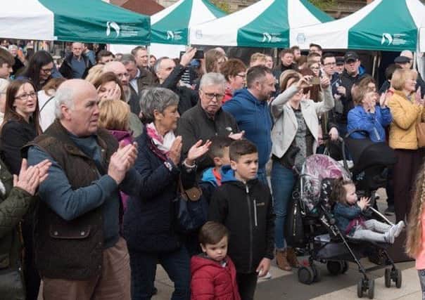 Part of the audience who listened as  members of Lisneal College's Jazz Band  performed in Guildhall Square on Saturday afternoon. Picture Martin Mckeown. Inpresspics.com. 29.04.17