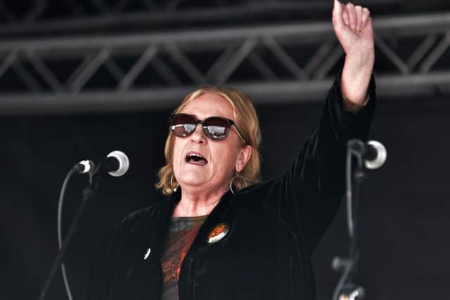 Eileen Webster sings The Internationale at the May Day rally in Guildhall Square on Saturday last. DER1717GS010