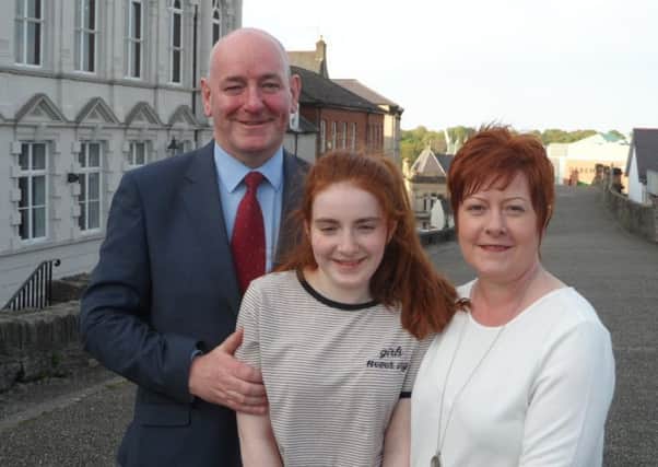 Mark Durkan with his wife Jackie and daughter Dearbhail.