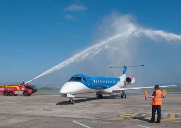 The BMI Regional flight from Stanstead to City of Derry Airport arrives in the North West for the first time on Tuesday as passengers were greeted by a water arch from the firecrews based at the Airport. Picture Martin McKeown. Inpresspics.com. 02.05.17