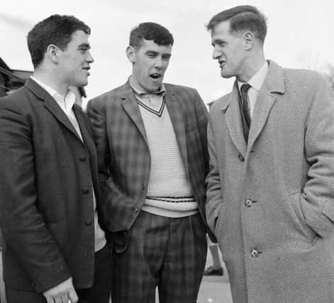 Derry City players Jimbo Crossan, Matt Doherty and  the late, Eunan Blake relax before the 1964 Irish Cup Final victory over Glentoran at Windsor Park.