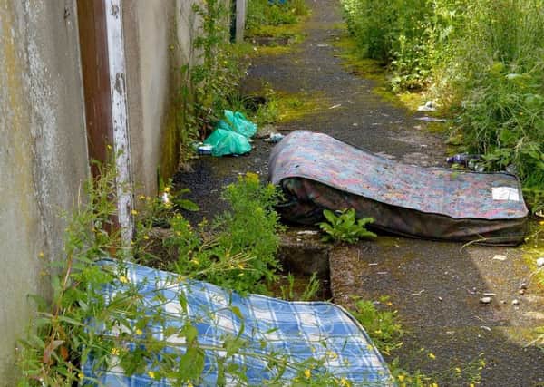 Mattresses previously dumped in a laneway off Lone Moor Road.