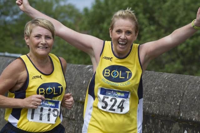 Runners representing Bolt Running Club are all smiles during the Strabane Lifford Half Marathon.