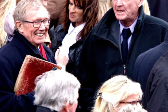 Journalist Peter Taylor (on left) and former MI6 officer Michael Oatley were among the mourners at Brendan Duddys Requiem Mass.