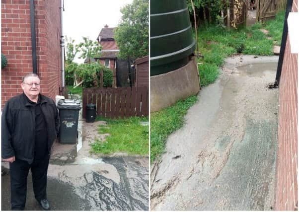 Councillor Tony Hassan at the woman's home with sewage running alongside it, and in through the back garden (right).