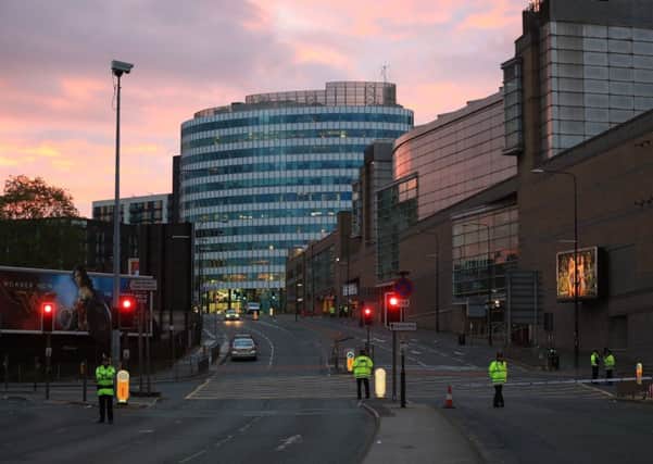 Dawn over Manchester the morning after a suspected terrorist attack at the Manchester Arena at the end of a concert by US star Ariana Grande left 19 dead. (Peter Byrne/PA Wire)