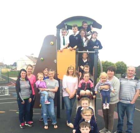 Community representatives, local mums and children and Sinn fein Colr. Tony McCaul at the new play park in Feeny