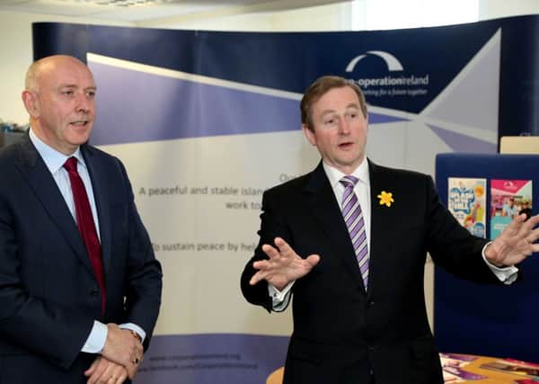 Peter Sheridan with Enda Kenny in 2015.