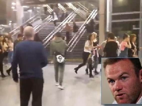 An image taken shortly after the terror attack. Inset: Wayne Rooney.