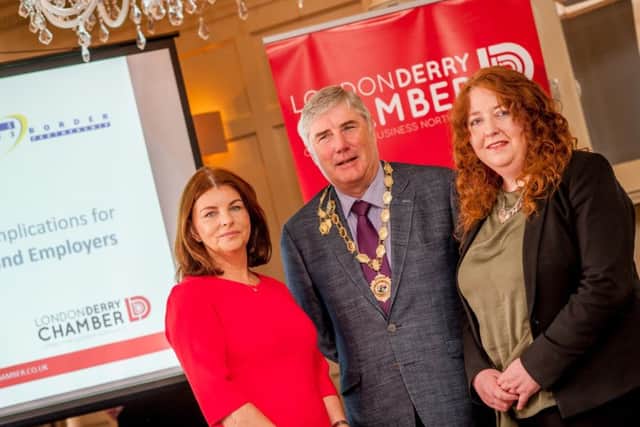 Chamber of Commerce Chief Executive Sinead McLaughlin (left) and President George Fleming with Rose Tierney.