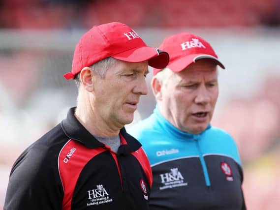 Derry manager Damian Barton with Tony Scullion.