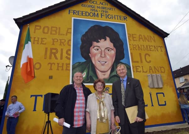 Mrs Bridie McBrearty pictured with Monaghan republican John Crawley and former NORAID director Martin Galvin at the recent unveiling of a mural in Rathkeele Way in memory of her son and IRA Volunteer George who was shot dead by members of the SAS while on active service in 1981.  DER2217GS003