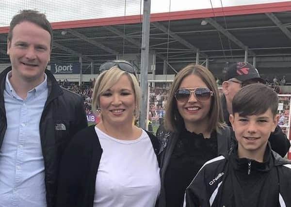 Fiachra McGuinness, Michelle ONeill, and Elisha McCallion with her son DaithÃ­ at the Derry vs Tyrone game at Celtic Park at the weekend.