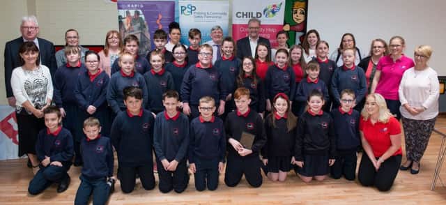 Pupils and staff from St. Oliver Plunkett Primary School pictured with PCSP Chairman Councillor Gus Hastings, the actors and the facilitators from RAPID who attended the launch of the new Cyber Bullying Awareness DVD at Strathfoyle Youth Centre. Picture Martin McKeown. Inpresspics.com. 24.05.17