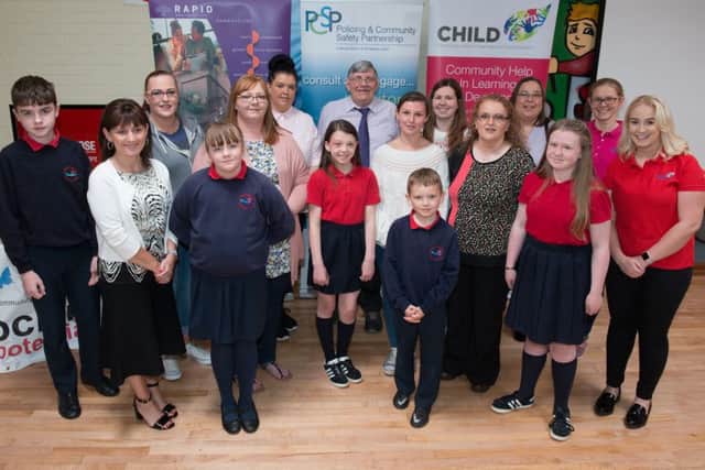 Pupils from St. Oliver Plunkett Primary School pictured with PCSP Chairman Councillor Gus Hastings, the actors and the facilitators from RAPID who attended the launch of the new Cyber Bullying Awareness DVD at Strathfoyle Youth Centre. Picture Martin McKeown. Inpresspics.com. 24.05.17