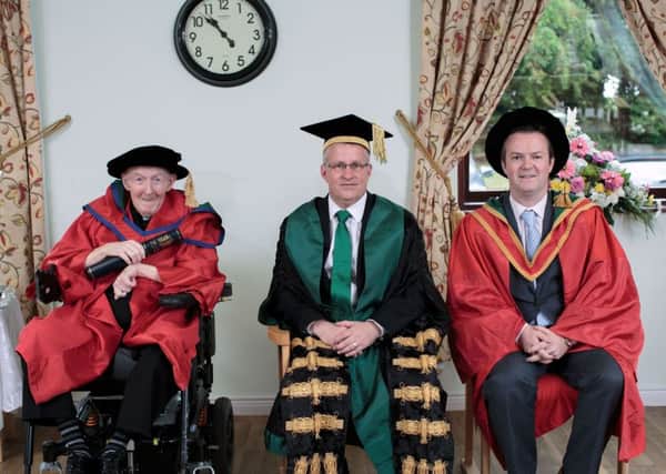 Rev. Fr Harry Coyle who was awarded a honorary doctorate by Ulster University today in recognition of his lifetime of achievements in Irish language teaching and scholarship. Pictured with Fr Coyle are Professor Paddy Nixon and Dr Malachy ONeill, Ulster University. (Photo: Nigel McDowell/Ulster University)