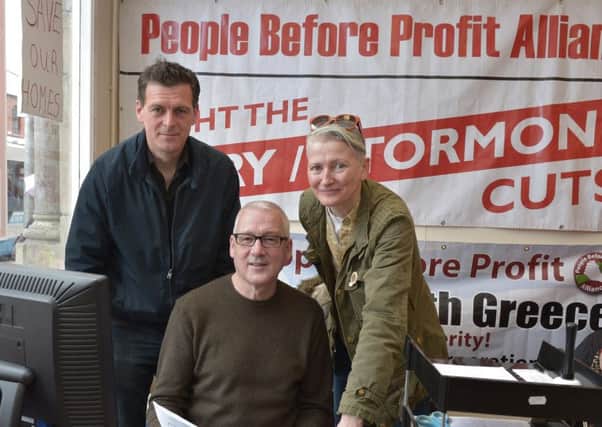 People Before Profit election workers Shaun Harkin, Jim Doherty and Sha Gillespie pictured in the PBP office in Foyle Street Derry. Eamonn McCann is running as a PBP MLA candidate in the Assembly elections on 5th May next. DER1716GS007