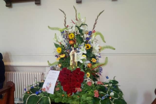 One of the religious themed floral displays at St Patrick's Church in Pennyburn