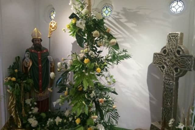 Floral display dedicated to St Patrick at the church in Pennyburn.