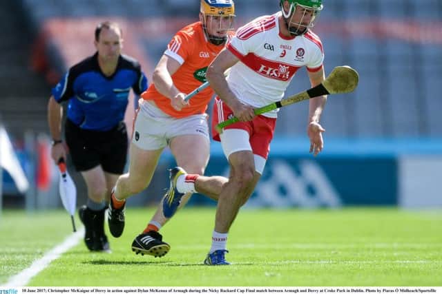 Christopher McKaigue of Derry in action against Dylan McKenna of Armagh during the Nicky Rackard Cup Final at Croke Park in Dublin.