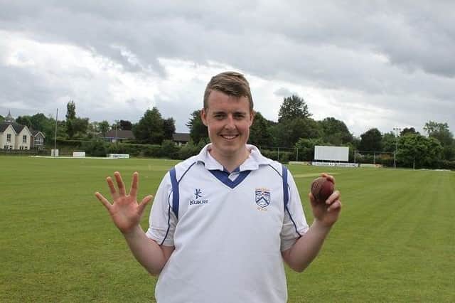 Coleraine's Stephen Hutchinson celebrates taking five wickets against Brigade.