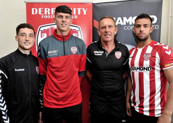 Derry City manager Kenny Shiels pictured with new signings Jamie McIntyre, Eoin Toal and Darren Cole, at the clubs offices in the Rth Mr Business Park.