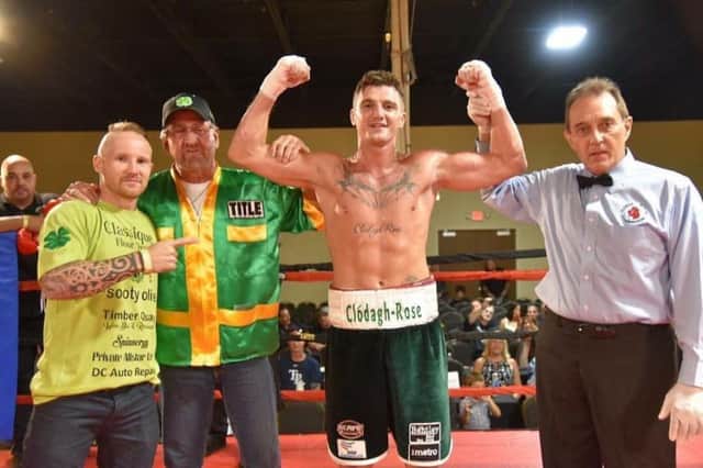 Derry's Connor Coyle pictured with his coach, Jim McLoughlin and stablemate and fellow Galliagh man John Cooley after his fifth professional win in Florida at the weekend.
