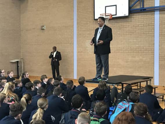 Jesse Jackson addressing pupils during his visit to the school. INLS 25-704-CON