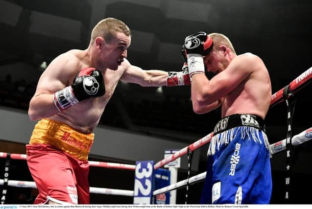 Sean McGlinchey, left, in action against Dan Blackwell during their Super Middleweight bout at the Battle of Belfast Fight Night at the Waterfront Hall in Belfast. Photo by Ramsey Cardy/Sportsfile