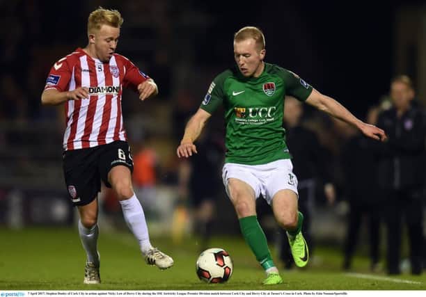 Nicky Low of Derry City, pictured with ex-City winger, Stephen Dooley, is hoping to sort out his future this weekend.