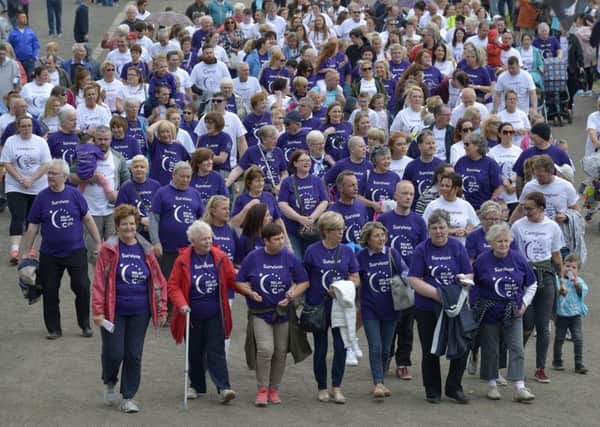 Cancer survivors and carers kick of the Relay for Life with a lap of honour in St Columbs Park on Saturday afternoon last. DER2517GS099