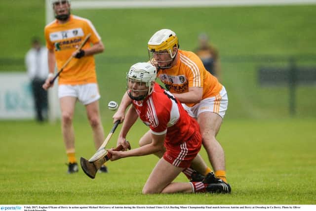 9 July 2017; Eoghan O'Kane of Derry in action against Michael McGreevy of Antrim during the Electric Ireland Ulster GAA Hurling Minor Championship Final match between Antrim and Derry at Owenbeg in Co Derry. Photo by Oliver McVeigh/Sportsfile