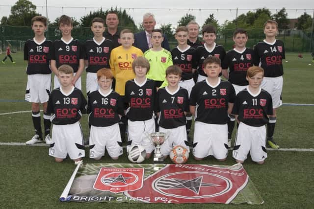 The Brightstars FC under 13 squad with coaches Kevin Tracey and Jeff Wetherall. In centre at back is team sponsor, Mr. Eddie O'Connor, Estate Agent. Not pictured but also big sponsors of the club are Adrian Kelly of EuroSpar and Gavin Higgins of Higgins Butchers.
