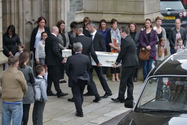 The small white coffin of six-year-old Donnacadh Ã¢Â¬ÃœDonnyÃ¢Â¬" Maguire is carried into St EugeneÃ¢Â¬"s Cathedral for Requiem Mass on Saturday morning. The St EugeneÃ¢Â¬"s Primary School pupil died following a tragic accident on Tryconnell Street on Tuesday 11th July last. DER2817GS050