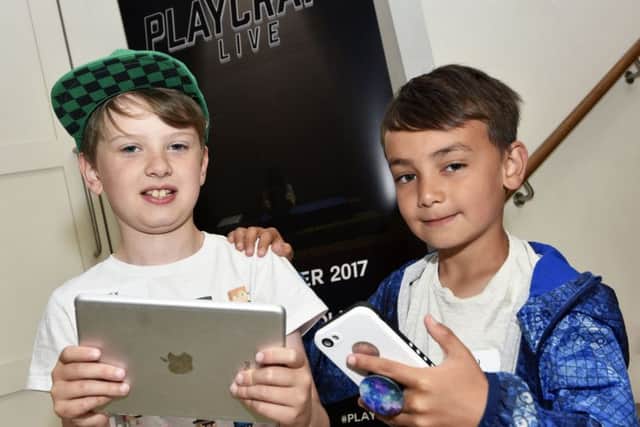 Alex Deery and Matthew Kilgore were pictured during yesterday's Minecraft Workshop in The Playhouse. DER2817-133KM