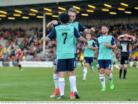 Barry McNamee is congratulated by Ronan Curtis after scoring Derry City's opening goal during the SSE Airtricity League Premier Division match against Bohemians at Dalymount Park