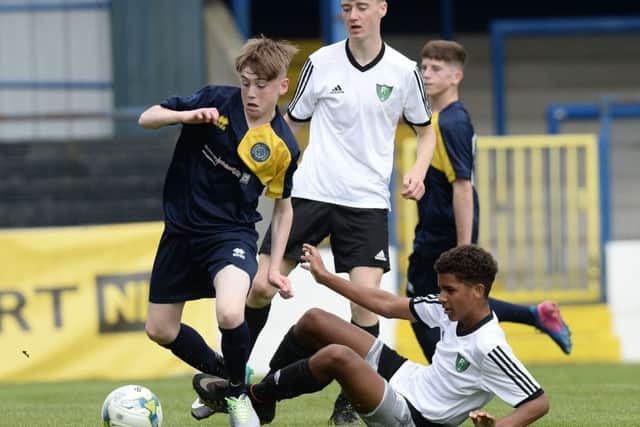 Co Londonderry's Daylan Farren  and First Choice Soccers Jackson Dickson