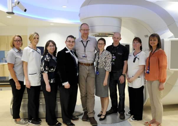 Staff at the North West Cancer Centre gather to mark the installation of Varian TrueBeam 2.7 on the treatment machines, a new first in the UK and Ireland and only the fourth in world.