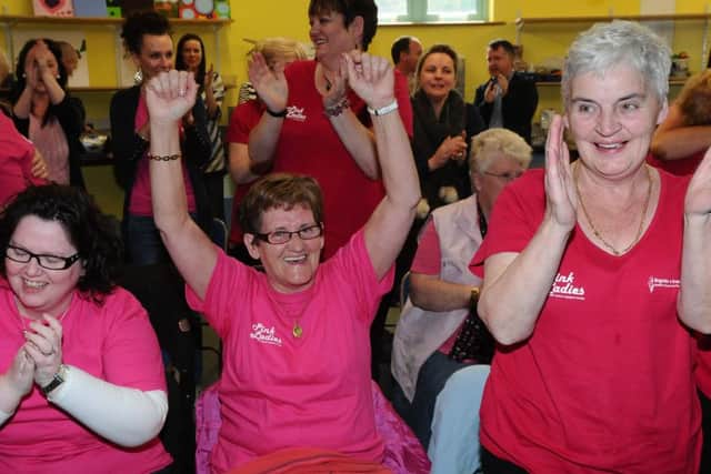 Members of the Pink Ladies Cancer Support Group celebrate back in 2011 the announcement by Health Minister Edwin Poots that a new cancer centre will be built at Altnagelvin Hospital. The cancer support group met in the Gasyard in Derry to watch the announcemnt live on the internet. Six years on and the Cancer Centre is now open and treating patients. Picture Martin McKeown. Inpresspics.com. 23.5.11