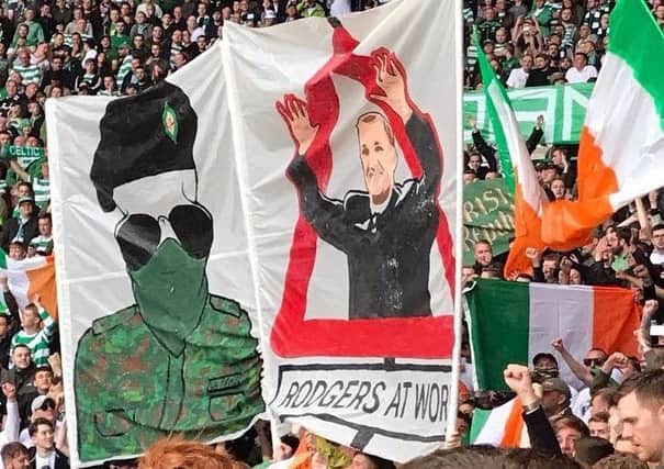Banners which were displayed during the Celtic v Linfield game in July