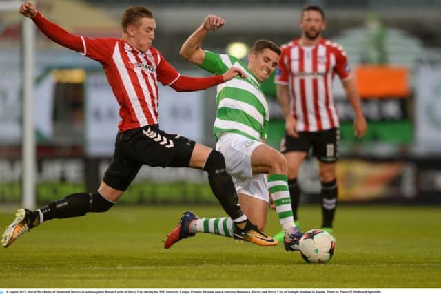 David McAllister of Shamrock Rovers in action against Ronan Curtis of Derry City during the SSE Airtricity League Premier Division match between Shamrock Rovers and Derry City at Tallaght Stadium in Dublin.